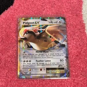 Pidgeot EX #64 – Pokémon Evolutions [Holo]